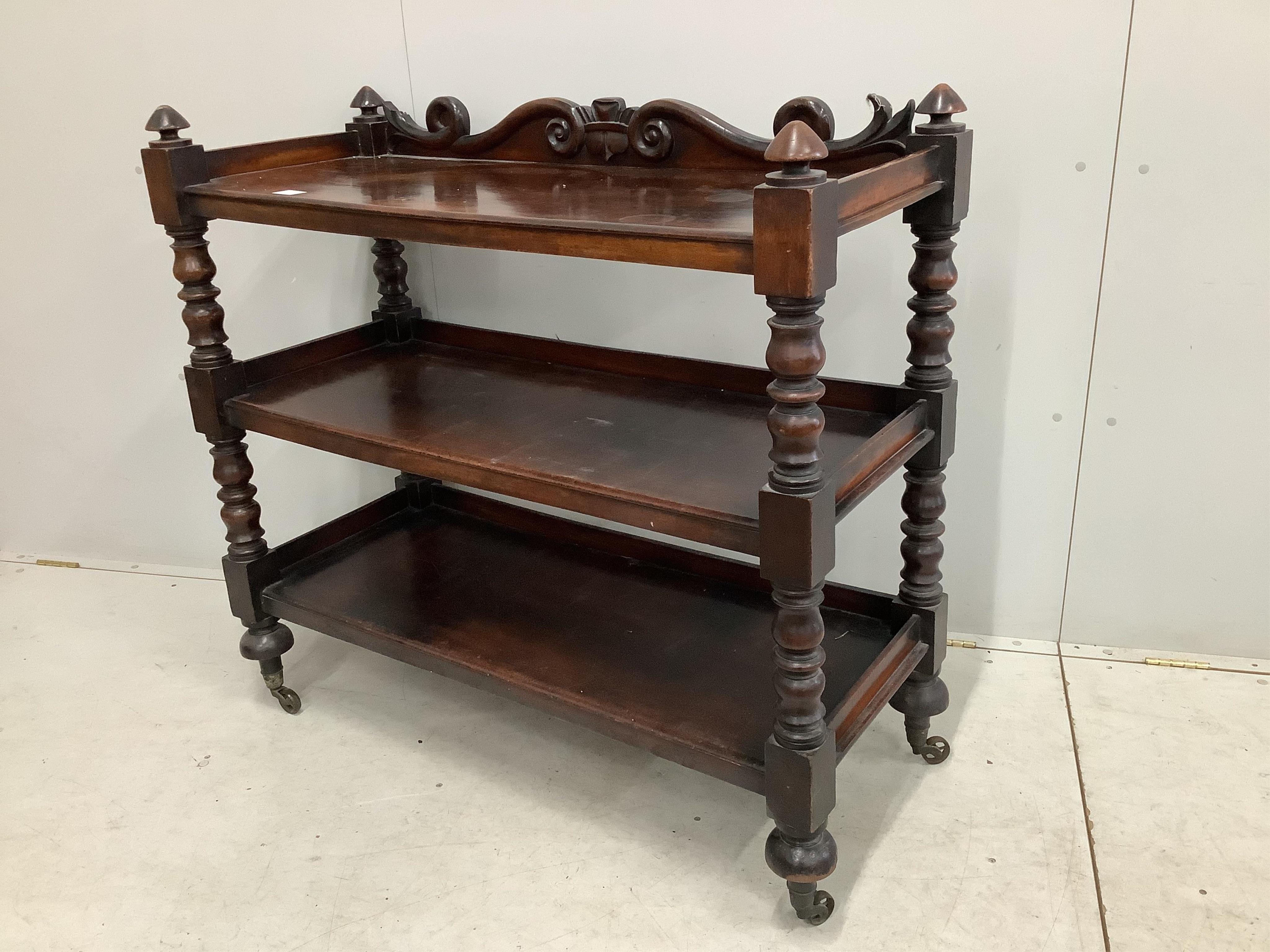 An early Victorian mahogany three tier buffet, width 114cm, depth 49cm, height 108cm. Condition - fair